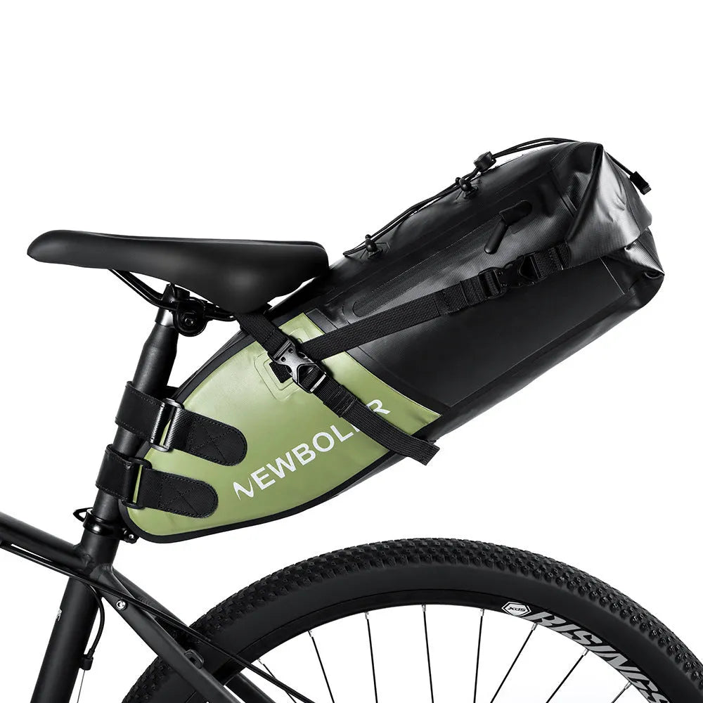 Large black waterproof bicycle tail bag attached to a bike seat post, showing its 13 litre capacity.