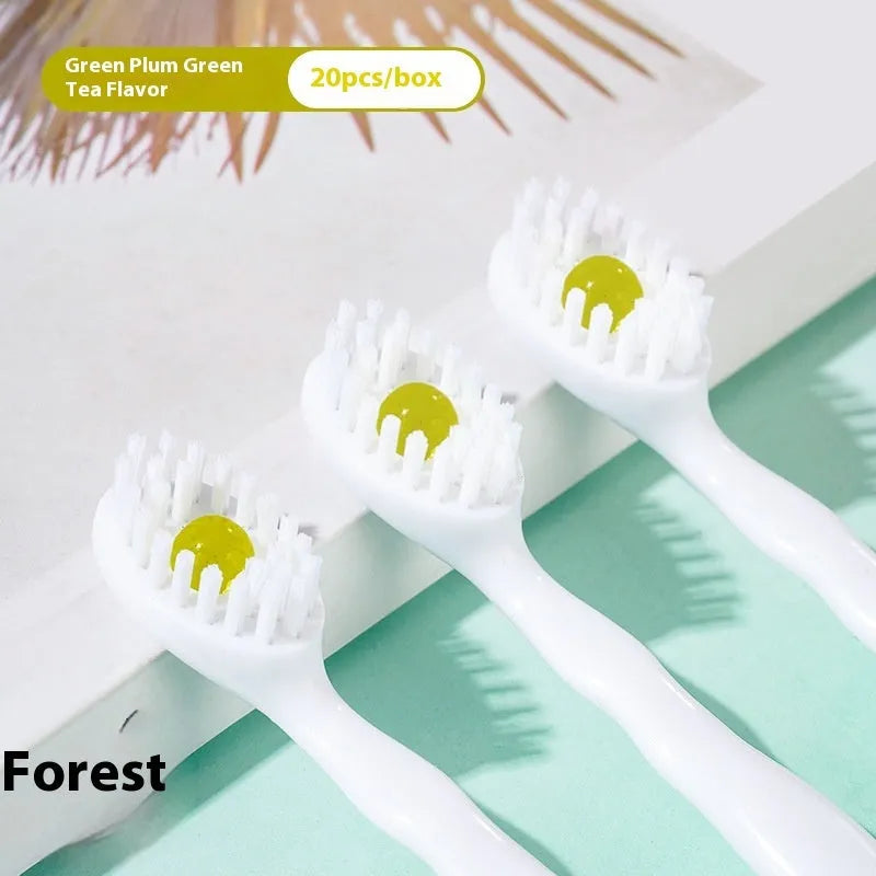 Box containing 20 individual pre-pasted bead toothbrushes for travel, shown with mint, peach, and green tea flavour options.