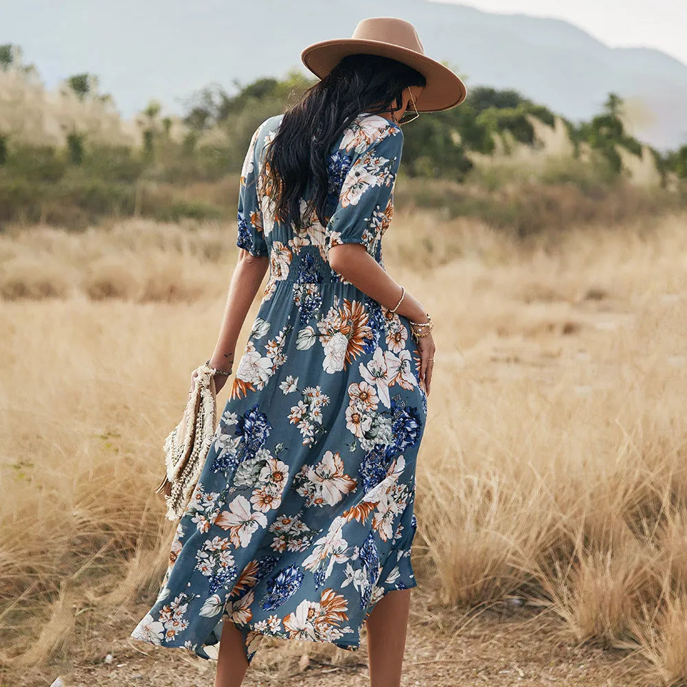 Women's floral V-neck summer dress with elastic waist and large hemline skirt in yellow colour