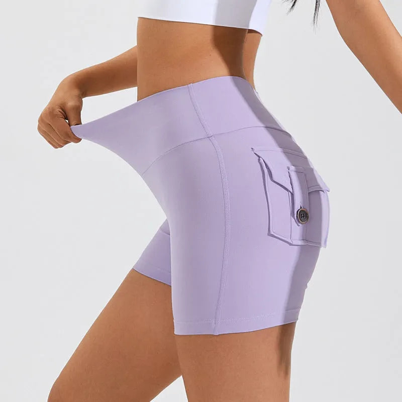 Women's high-waist fitness shorts with side pockets in quick-dry nylon fabric
