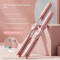 Children's adjustable length open back stick for posture correction in pink and blue colour options