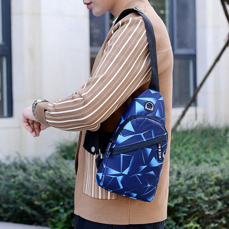 Men's crossbody messenger bag with earphone hole in Oxford cloth, showing zipper opening and shoulder strap