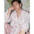 Men's floral long sleeve shirt with three-dimensional embossed patterns in blue colour showing loose fit design