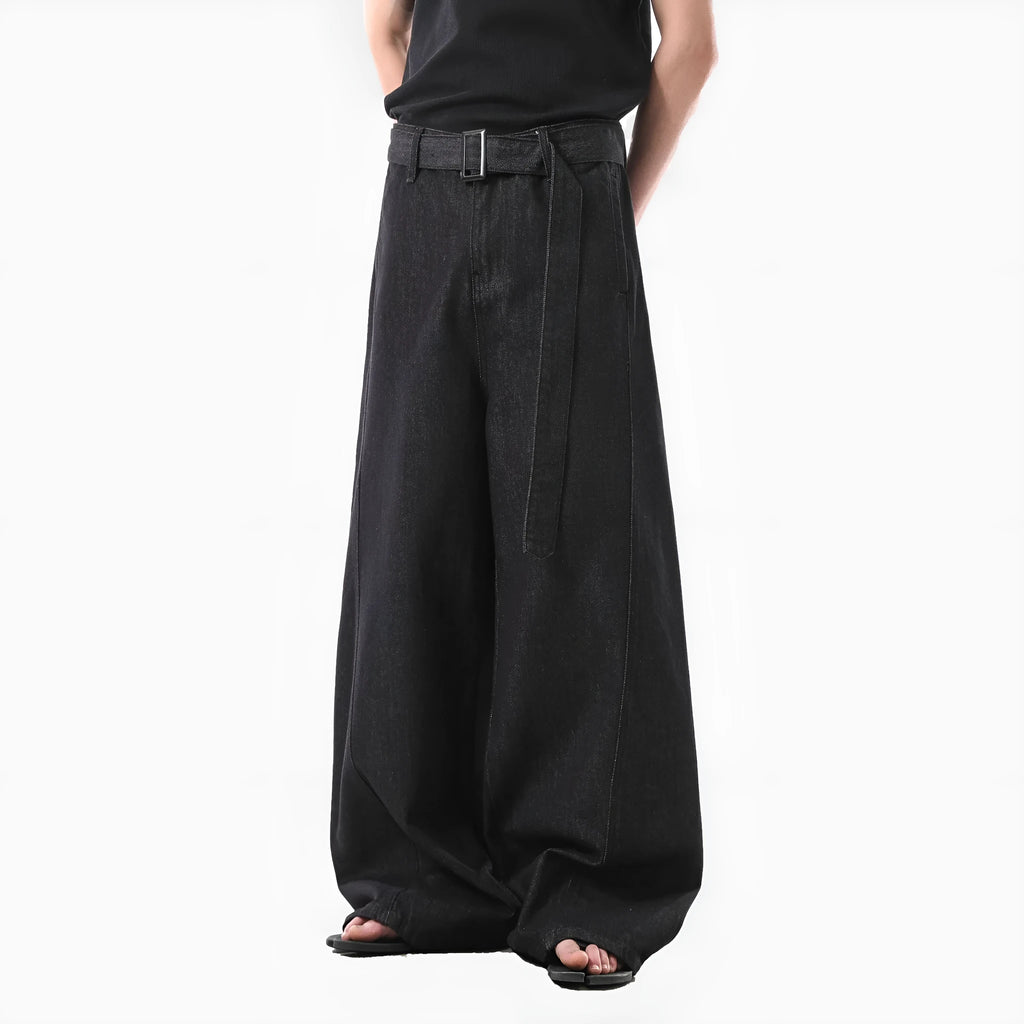 Black high waist straight-leg jeans with gold stitching on a mannequin