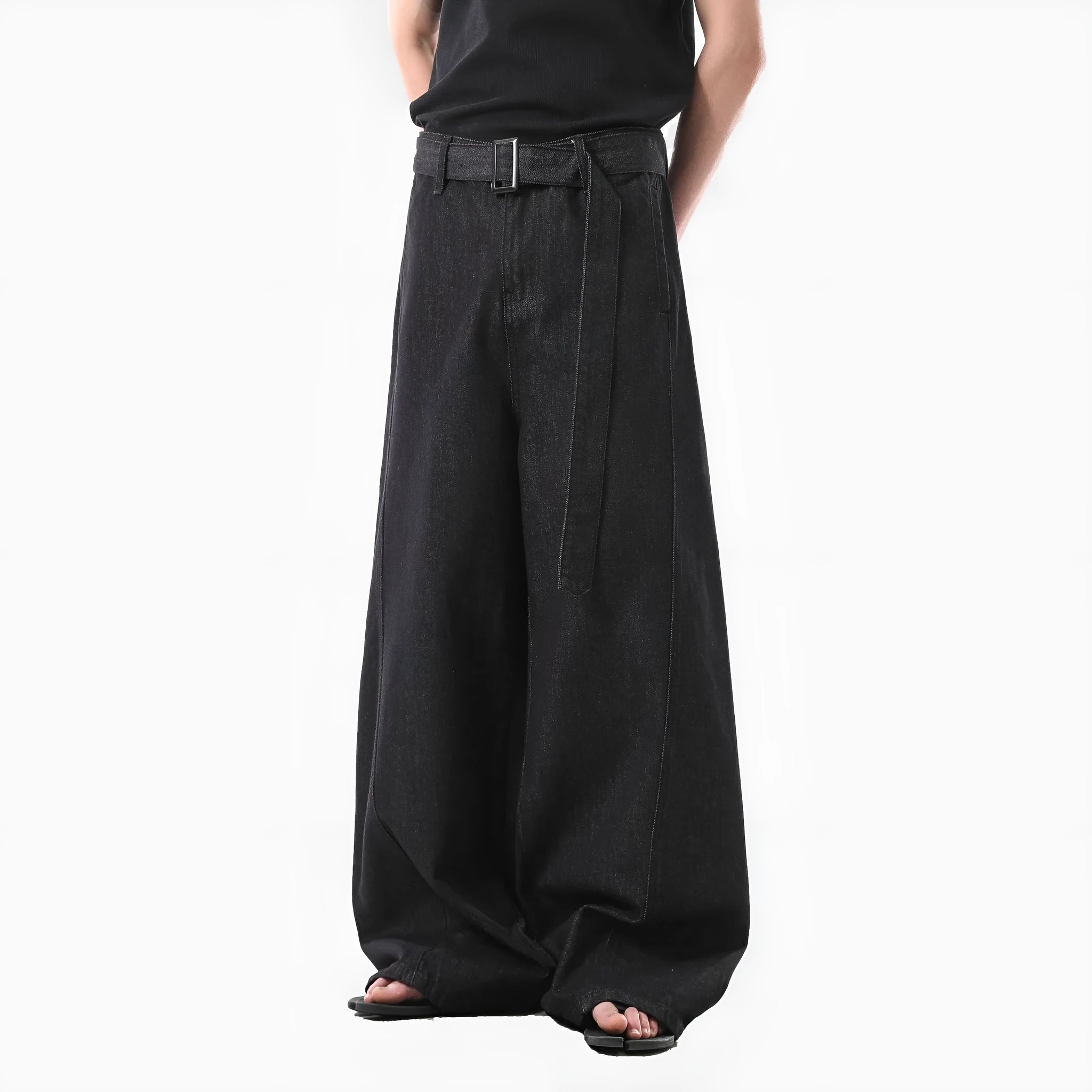 Black high waist straight-leg jeans with gold stitching on a mannequin