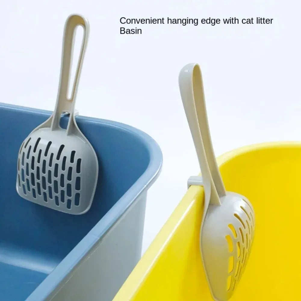 Grey plastic cat litter scoop with a built-in self-cleaning base and removable waste tray.