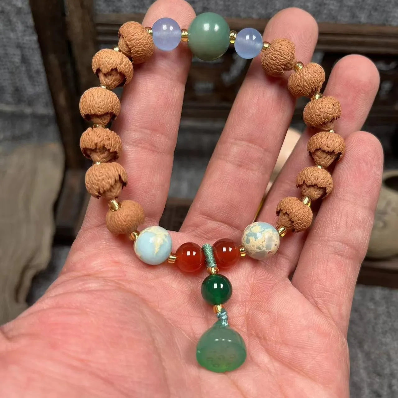 Carved pumpkin lotus Bodhi root bracelet with white jade beads and multiple dimensions