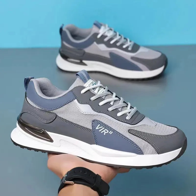 Men's colour block mesh sneakers in black, grey, and white with a lace-up design.