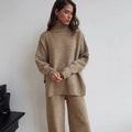 Women's acrylic fabric suit with side-slit sweater and matching trousers in solid colours