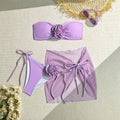 Women's pink tube top swimsuit with three-dimensional flower tie and matching skirt set