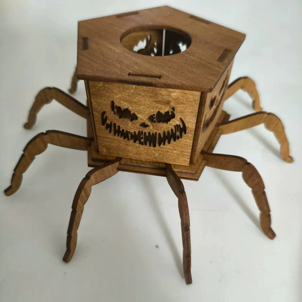 Wooden spider Halloween candlestick decoration measuring 21cm by 8.5cm