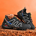 Men's grey orange and black white wide fit casual running shoes with low top design.
