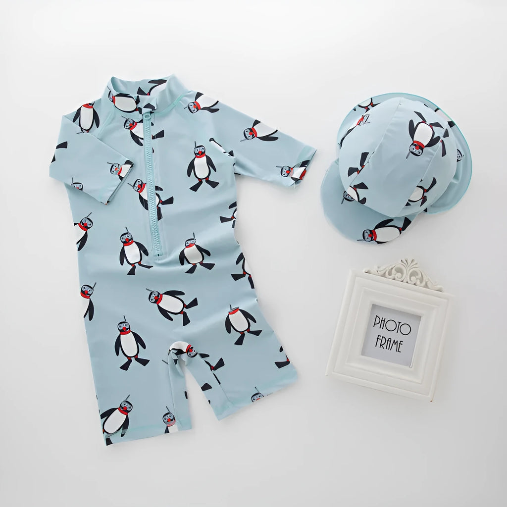 Boys' penguin print long sleeve swimsuit with matching swimming cap set