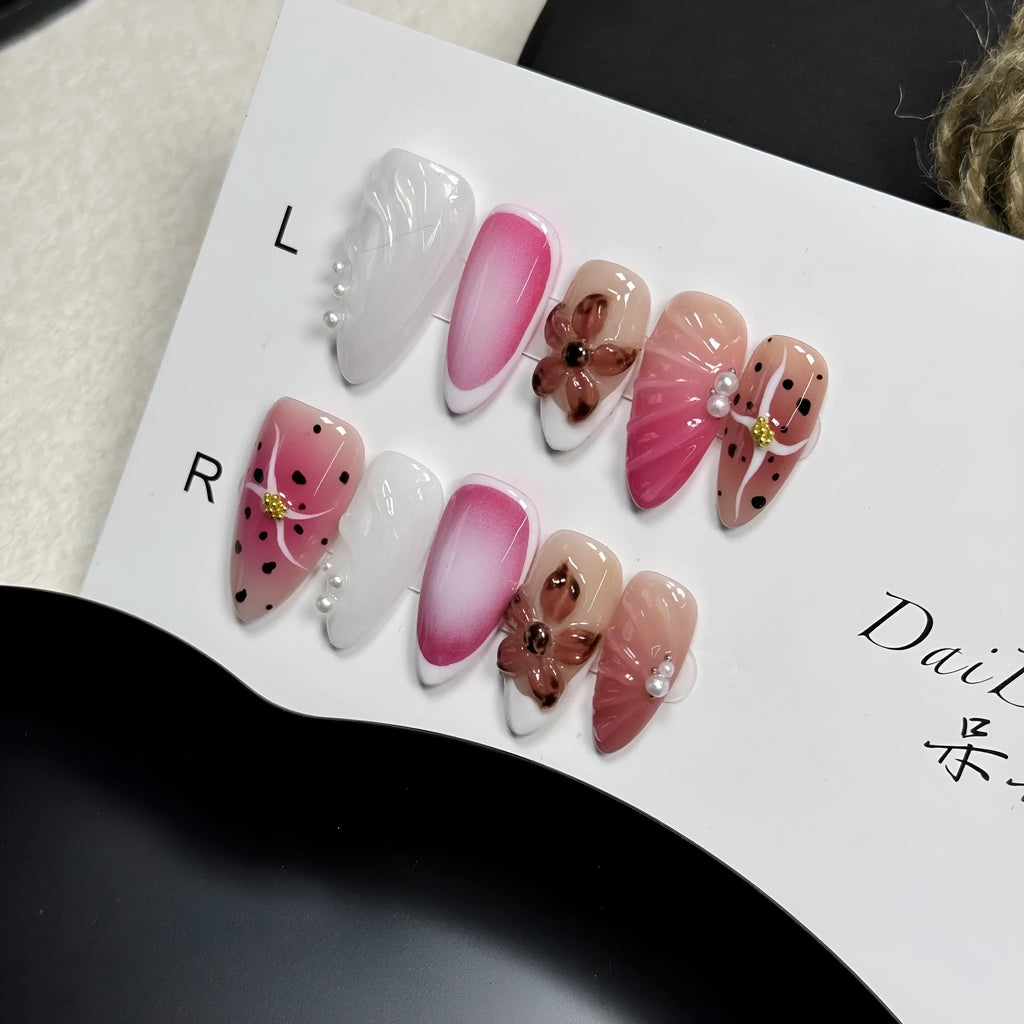 Hand-painted three-dimensional carved nail beauty patches in assorted colours and patterns.