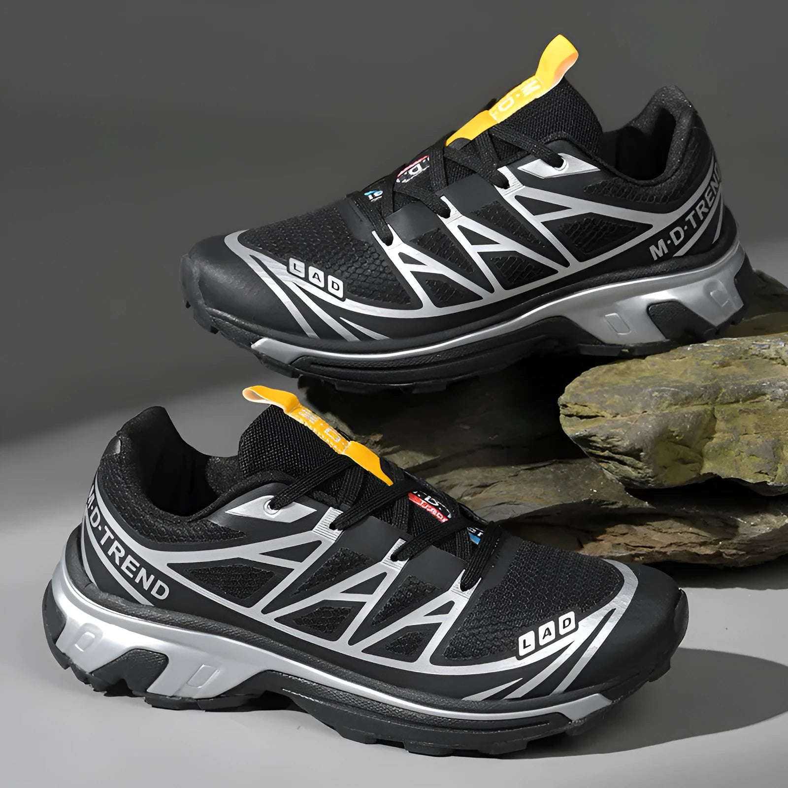 Unisex low-top lace-up leisure hiking shoes in a sport style with a round toe and flat rubber sole.