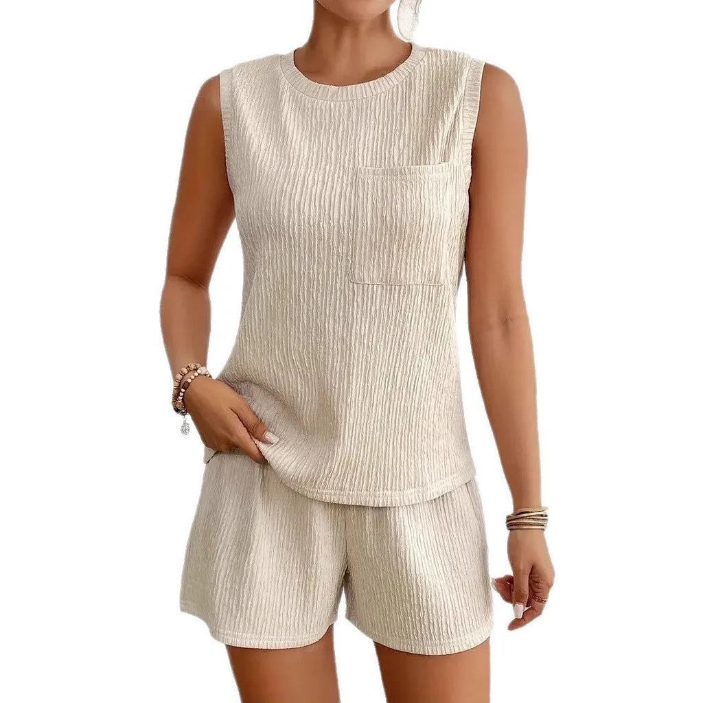 Women's apricot sleeveless round neck vest and matching shorts co-ord set laid flat