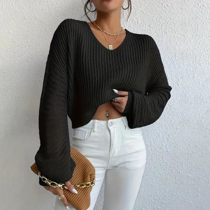 Women's long sleeve polyester pullover top in a solid colour with loose casual fit.