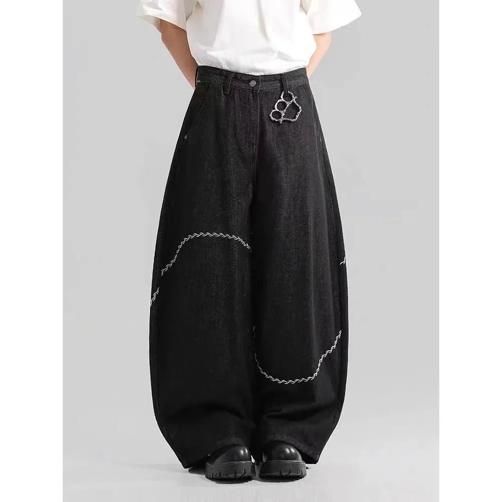 Black straight-leg denim trousers with mid-waist design and zip fly closure