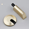 Zinc alloy wedge door stopper in six colour options on a wooden floor.