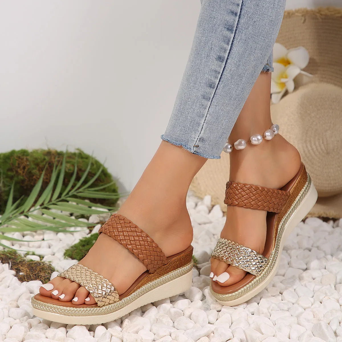 Women's metallic gold wedge sandals with adjustable strap and rubber wedge sole