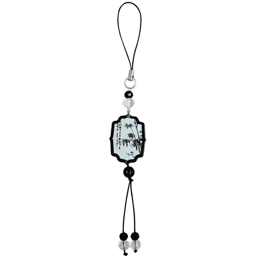 Guofeng Chinese style bead pendant keychain with detailed plant and flower pattern in a glossy finish.