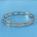 Women's hollow bracelet with four-leaf clover design in gold or silver options