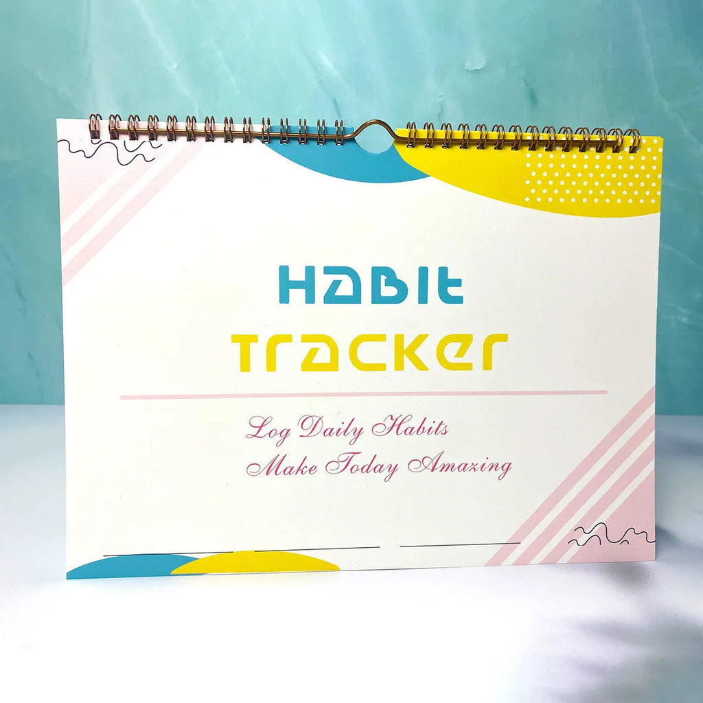 Habit tracking book with 12 pages showing colour options and 21x28cm size
