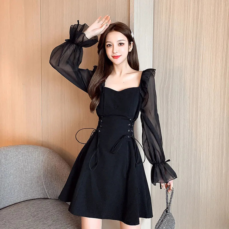 White women's chiffon dress with waist-slimming design and long sleeves