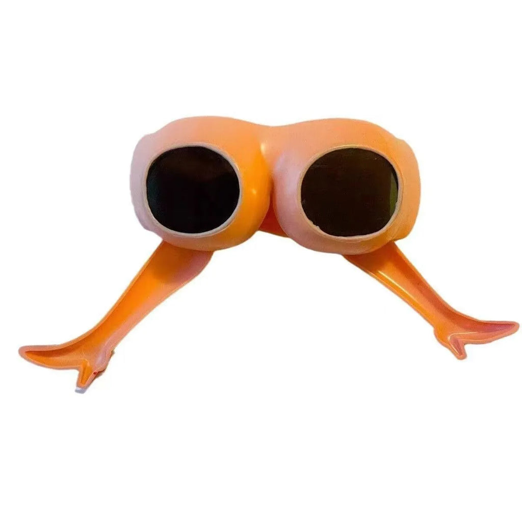 Orange plastic novelty sunglasses with a leg and hip design on the frame