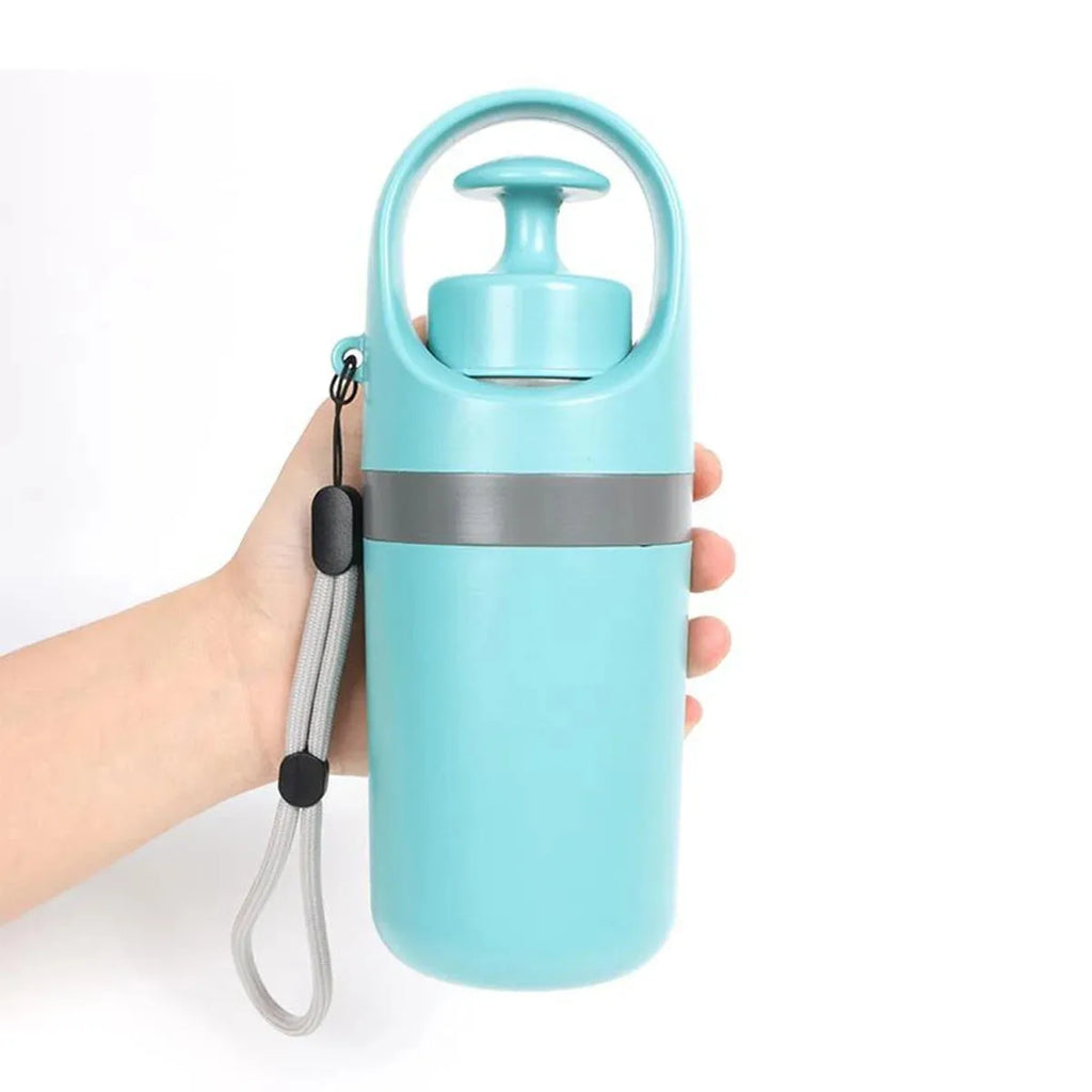 Blue and orange portable claw dog pooper scooper with built-in garbage bag dispenser.