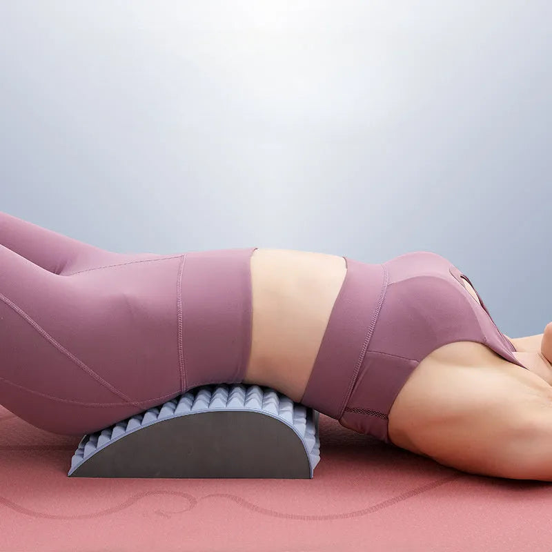 Blue EVA foam back stretcher pillow for neck and lumbar pain relief, 33cm long on a chair