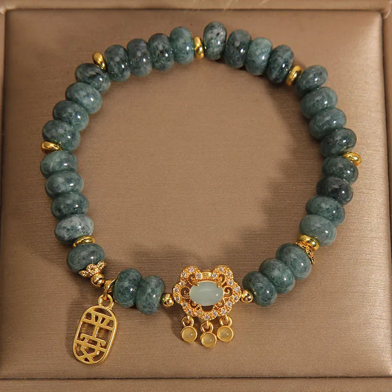 Women's natural emerald jade bracelet with abacus bead design and alloy safety lock closure