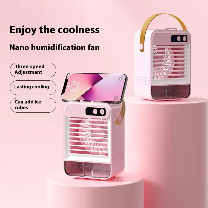 Dark green portable desktop fan with USB cable and control buttons showing compact 19x12.5x10cm dimensions