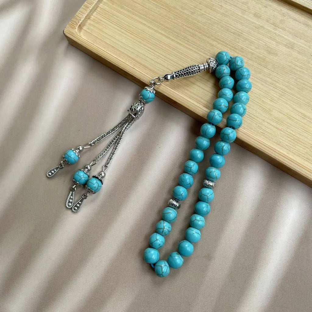 Handmade Muslim worship bracelet with sky blue 8mm stone beads for daily dhikr reminders.