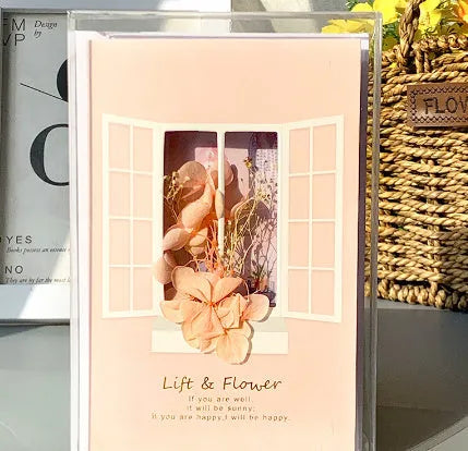 Handmade 3D butterfly-shaped birthday card with artificial flowers and hot foil stamping details.