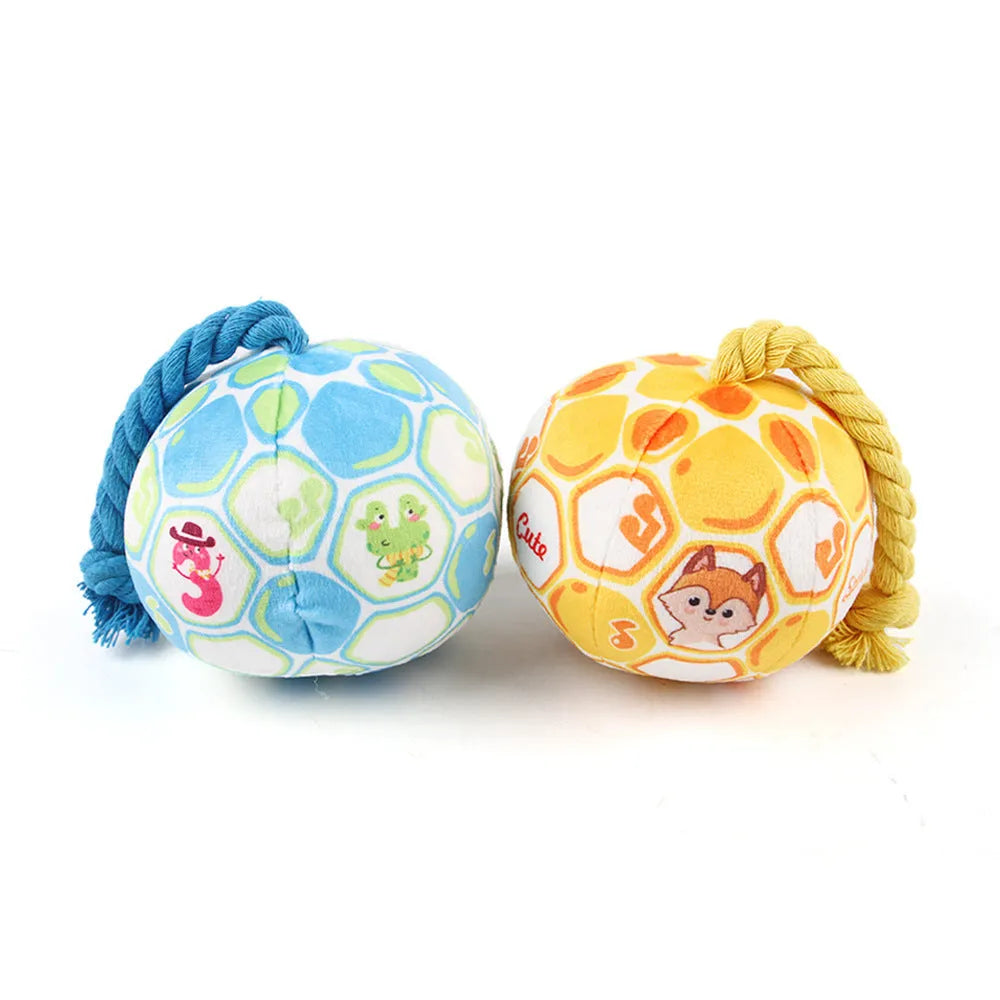 Blue and yellow elastic football dog tug toy with cotton rope construction for chewing and interactive play