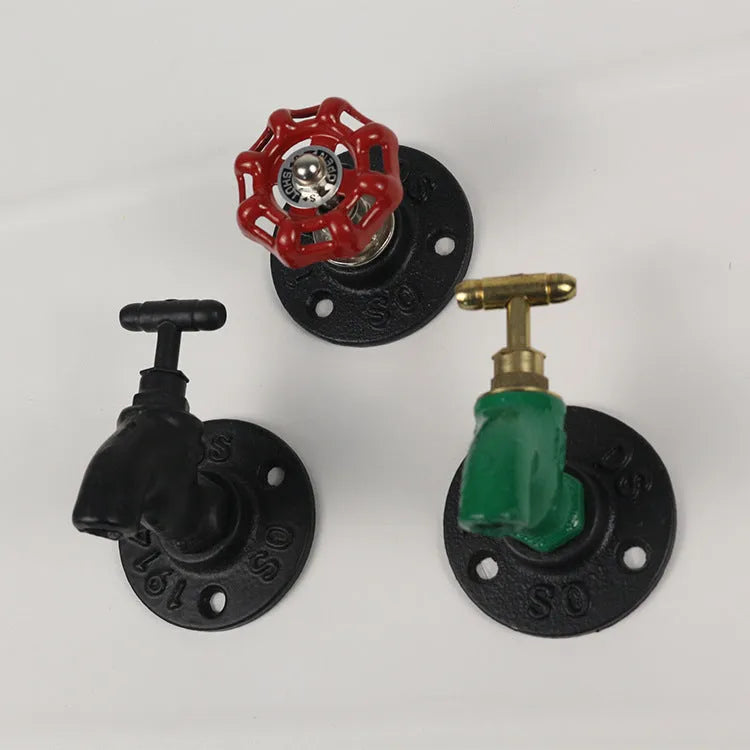 Water pipe style metal wall hanging hook for towels, shown in a choice of colours.