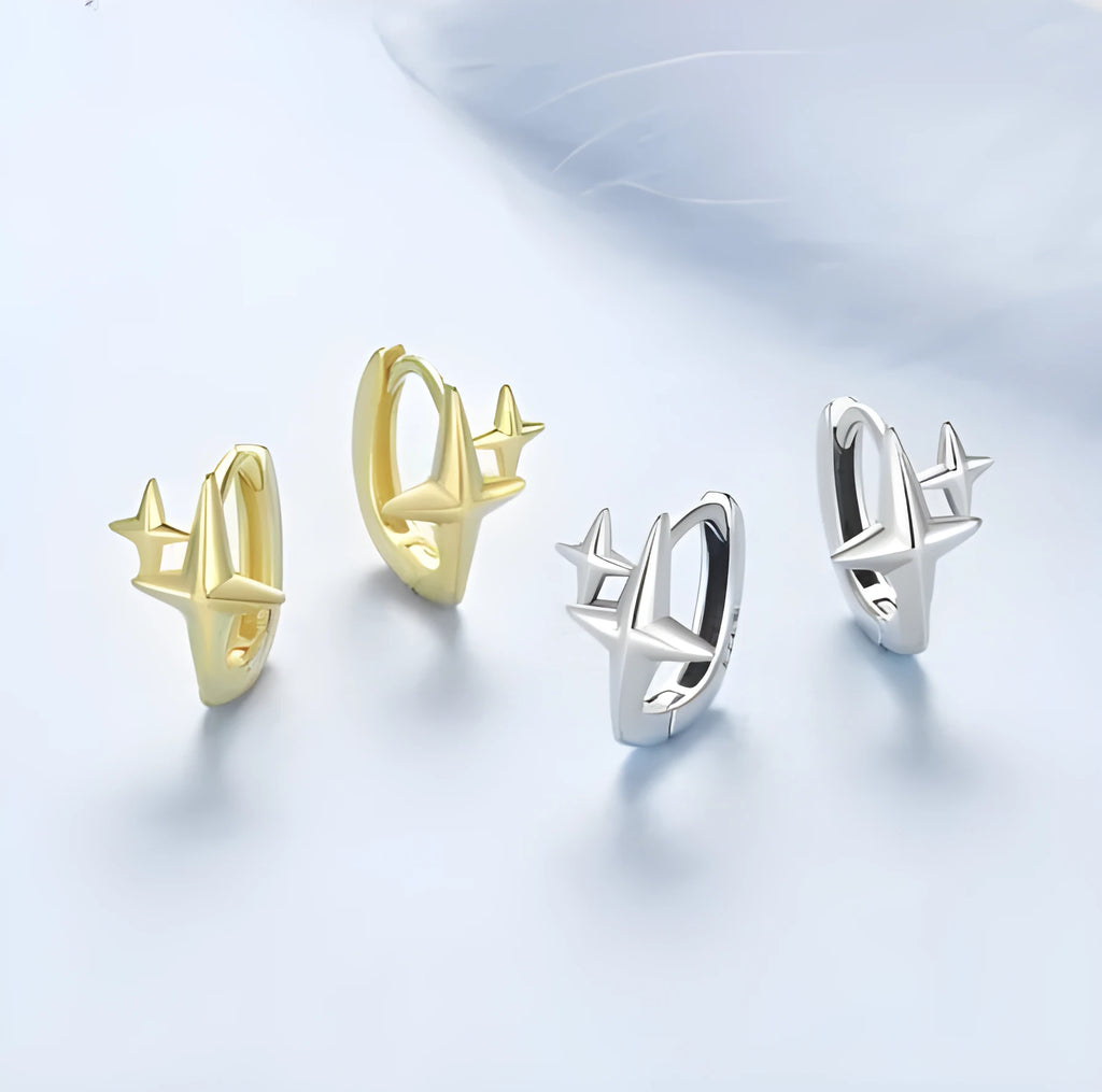 Sterling silver minimalist star ear clips with oxidised finish and clip-on fastening