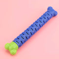 Blue-green silicone dog dental chew toy with brush head design and gum massage nodules for teeth cleaning