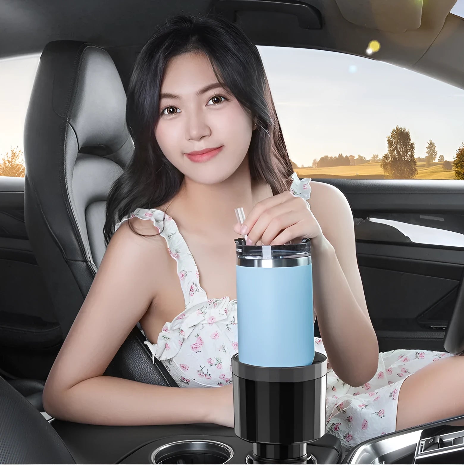 Matte black adjustable car cup holder expander for large bottles and drinks.