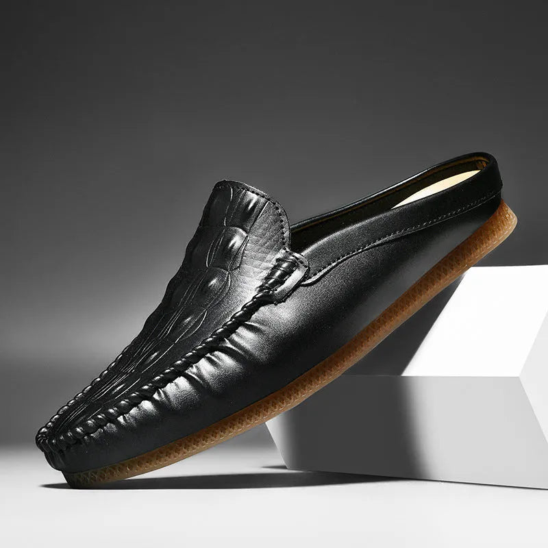 Men's black breathable semi-slippers with a rubber sole and artificial PU upper on a plain background.