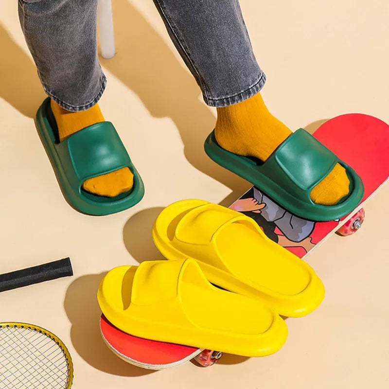 EVA flip-flop slippers with thick sole in assorted colours on a white background.