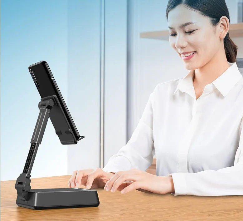 Black mobile phone broadcaster stand with integrated Bluetooth speaker and HD microphone on a desk.