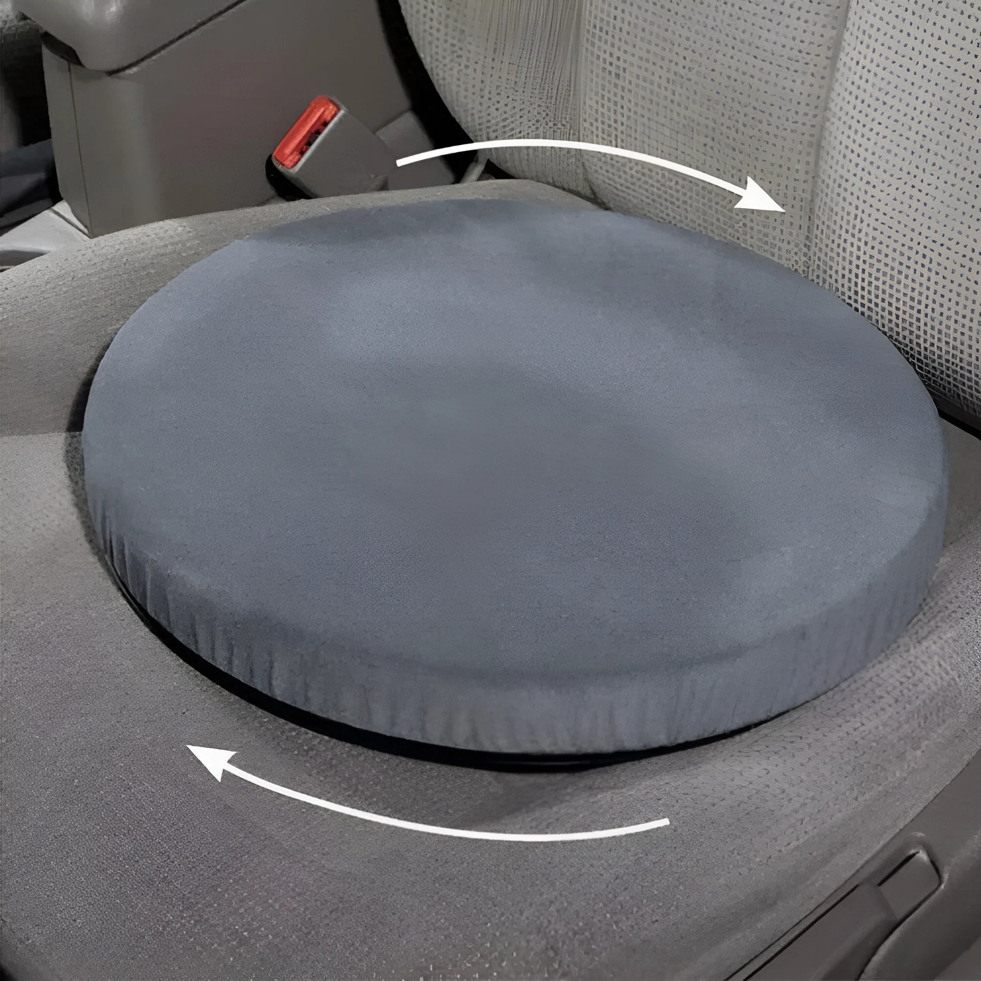 Grey rotating car seat cushion with non-slip base on a car seat.