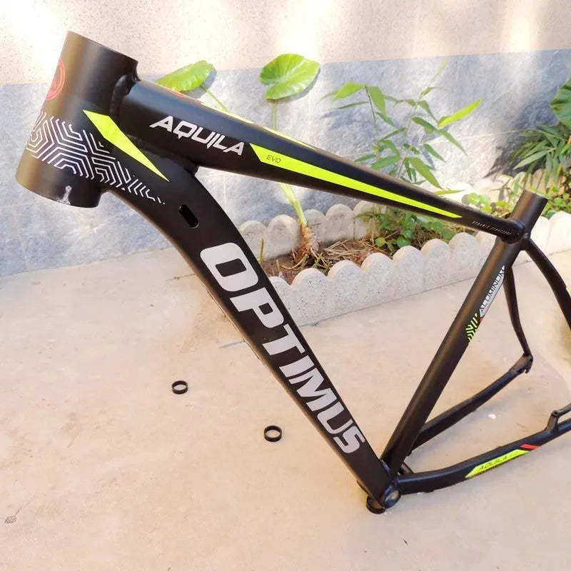 Black Green 29-inch aluminium mountain bike frame with disc brake mounts and inner line routing.