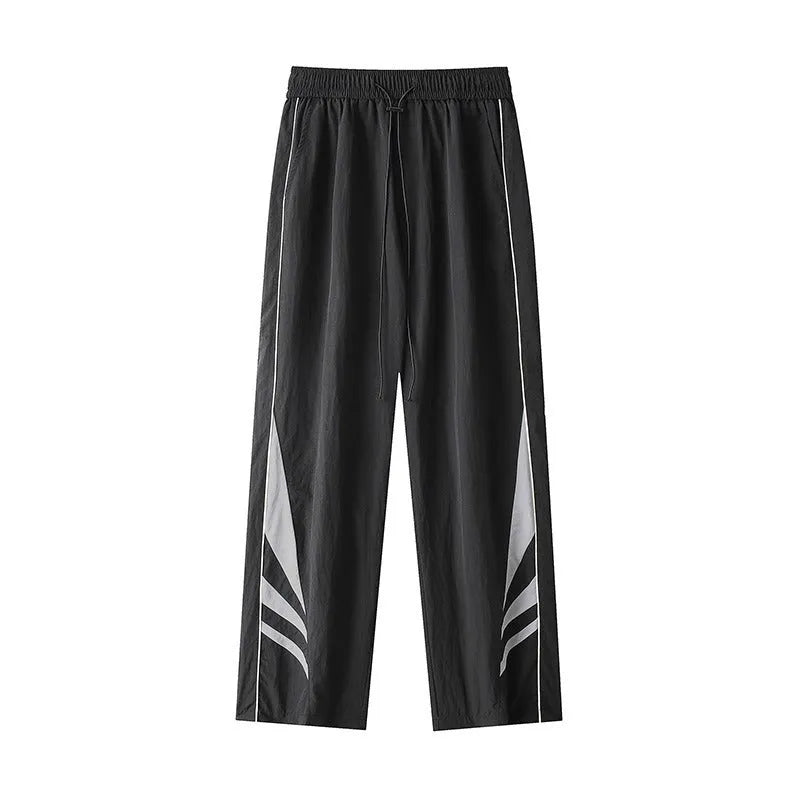 Men's black straight leg sports trousers with elastic waistband shown on hanger