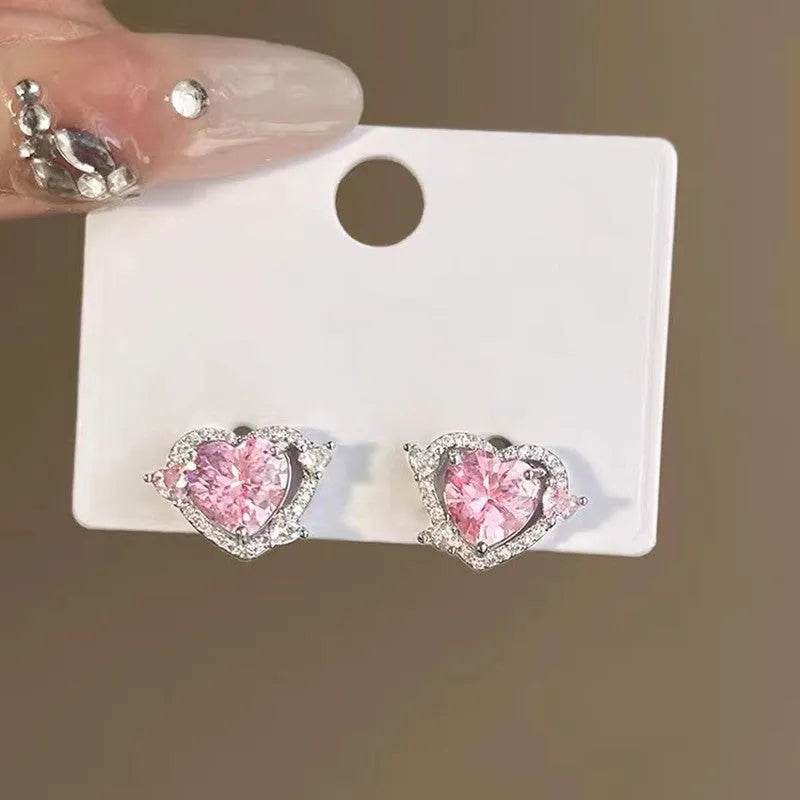 Women's heart stud earrings with white K electroplated finish on copper