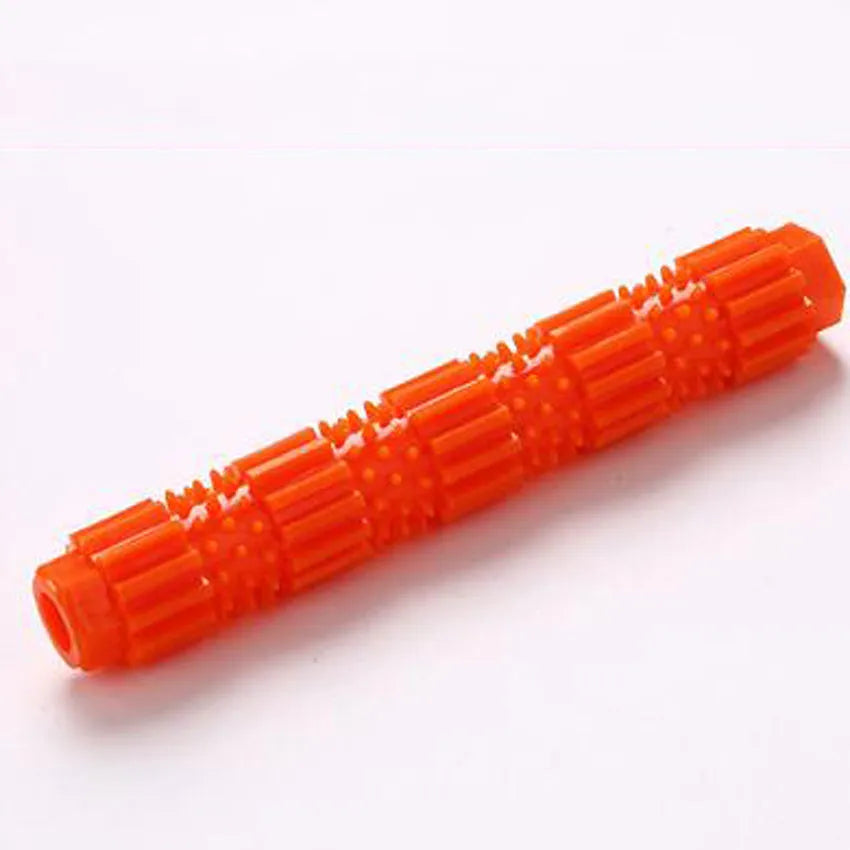 Green and orange natural rubber dog chew toy with treat holes and squeaker for small to medium aggressive chewers.