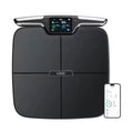 Black eight-electrode intelligent body fat scale on a floor