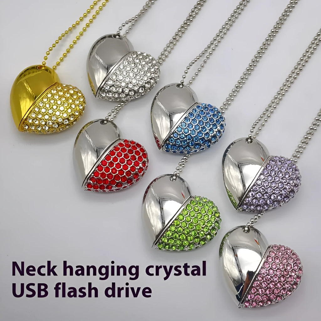 Heart-shaped silver USB drive with brick-like pattern, shown alongside blue and pink coloured versions.